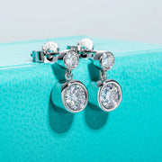 1.2cttw D Color Moissanite Drop Earrings.